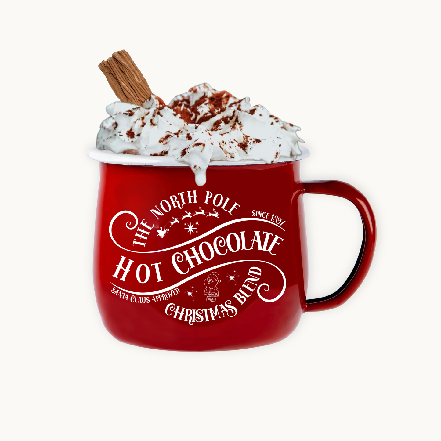Red mug with 'The North Pole Hot Chocolate Christmas Blend' text, filled with hot chocolate and whipped cream.