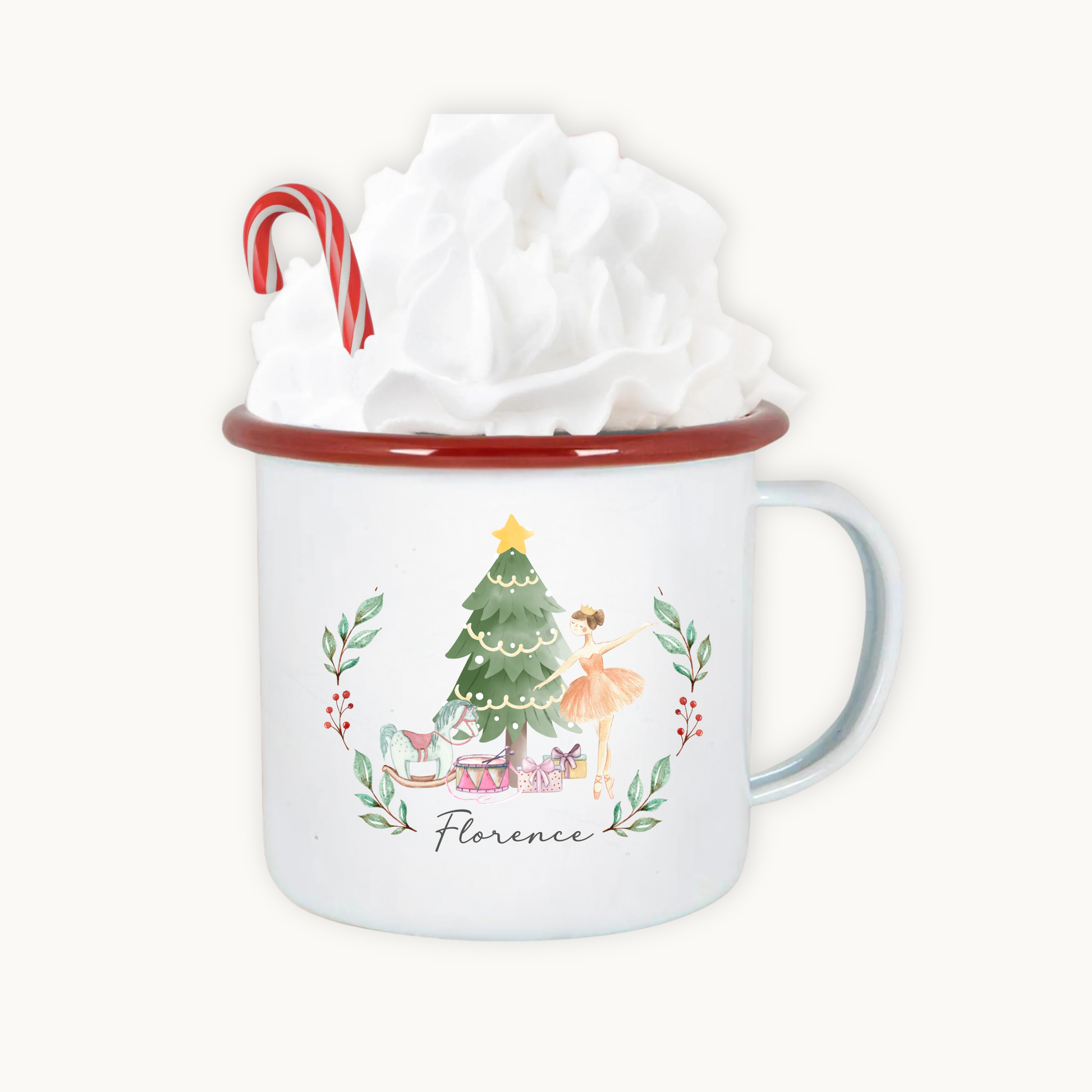 Mug with Christmas design and candy cane, wrapped in tissue paper on a white background