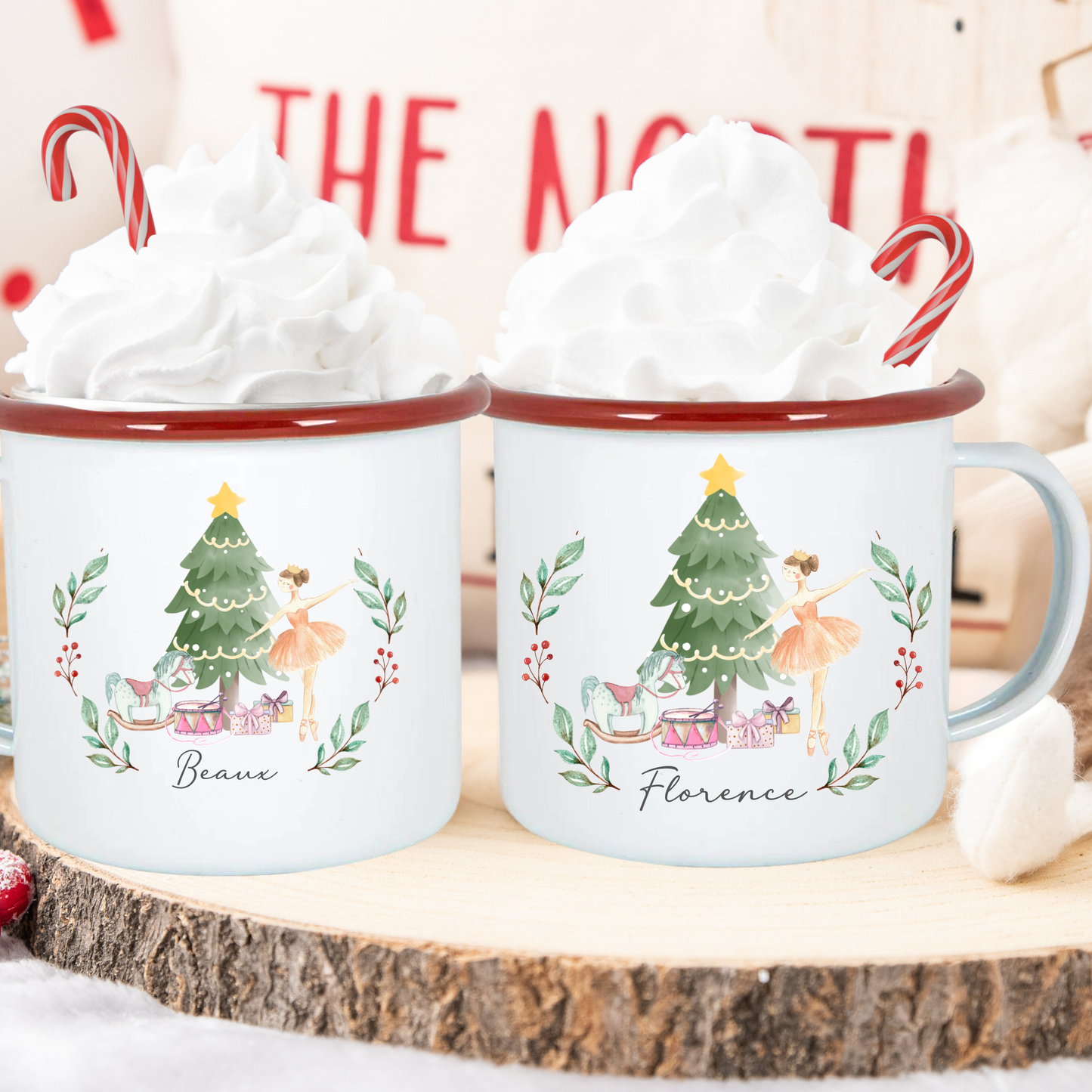 Two mugs with Christmas-themed designs and names 'Beau' and 'Florence' on a wooden surface.