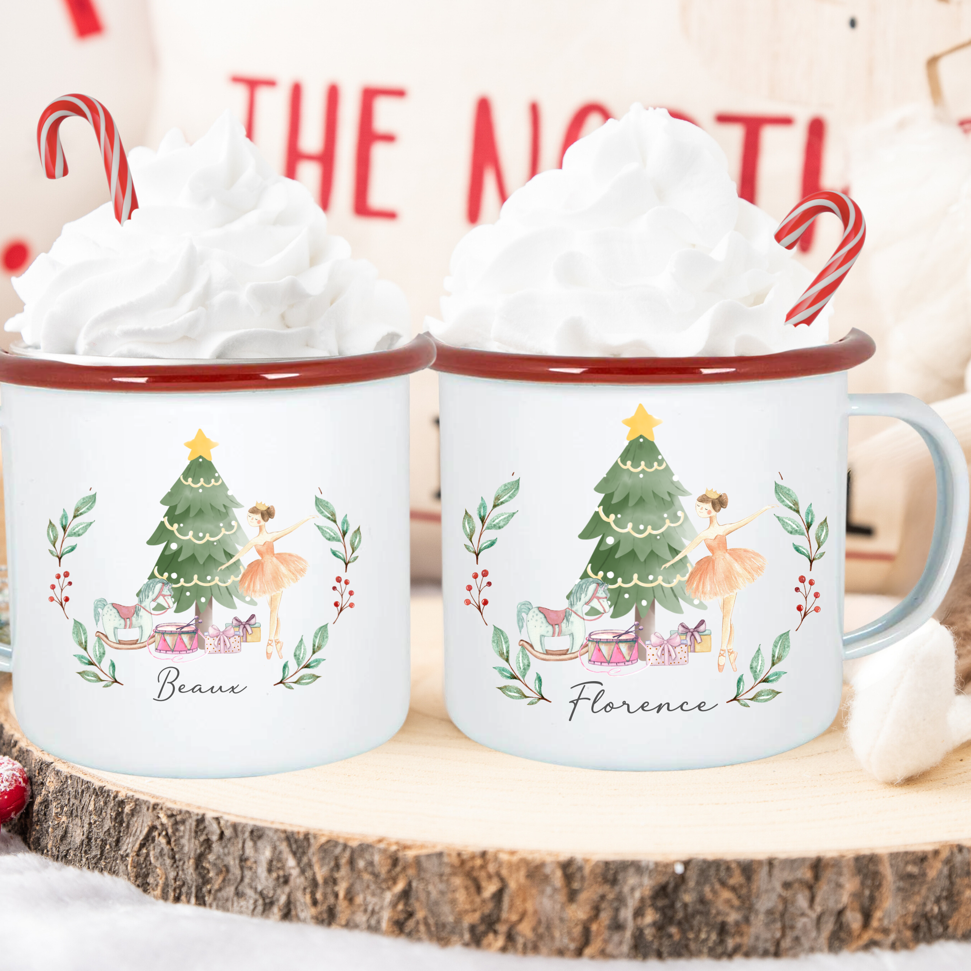 Two mugs with Christmas-themed designs and names 'Beau' and 'Florence' on a wooden surface.
