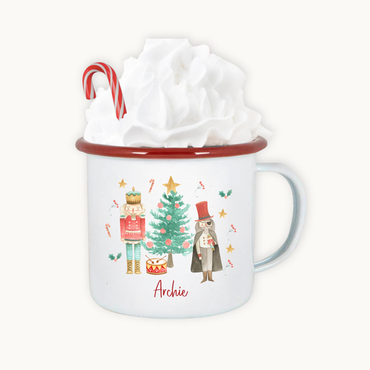 Christmas-themed mug with illustrations of a tree, Nutcracker, and Santa, featuring the name 'Archie'.
