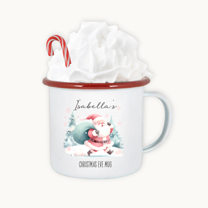 Christmas-themed mug with Santa Claus design and candy cane, wrapped in tissue paper.