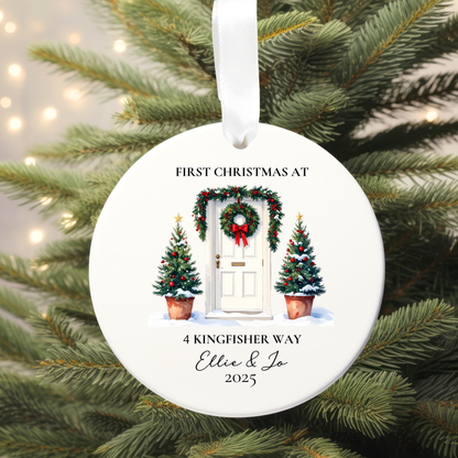Personalized Christmas ornament with festive design on a tree.