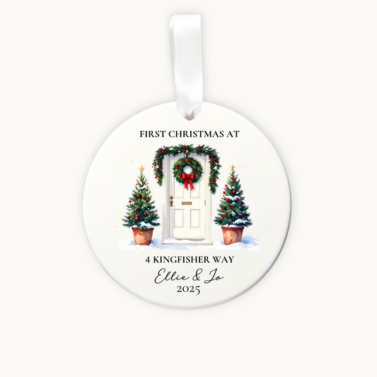 Personalized Christmas ornament with a door and trees design, featuring text for 'First Christmas at' and address details.