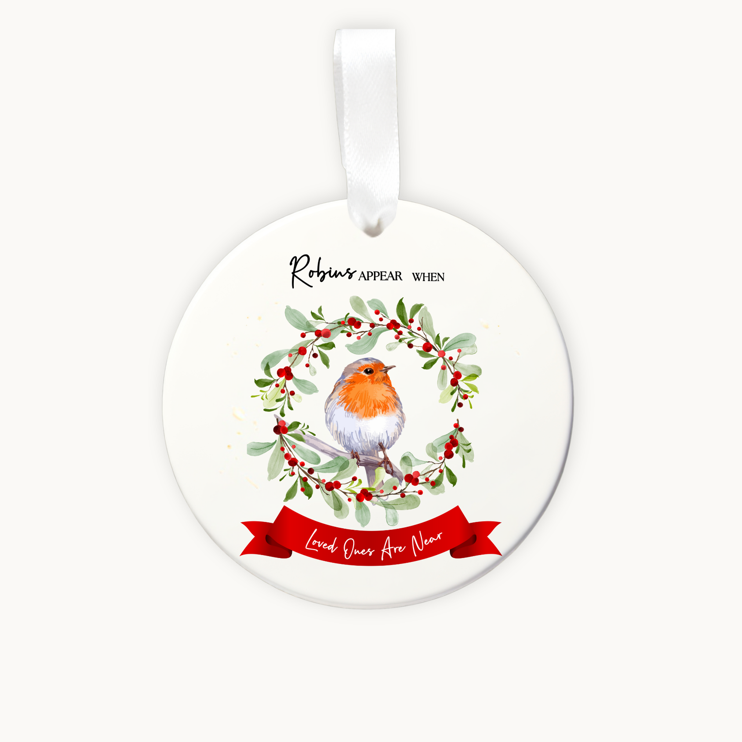 Round Christmas ornament with a robin and wreath design on a white background