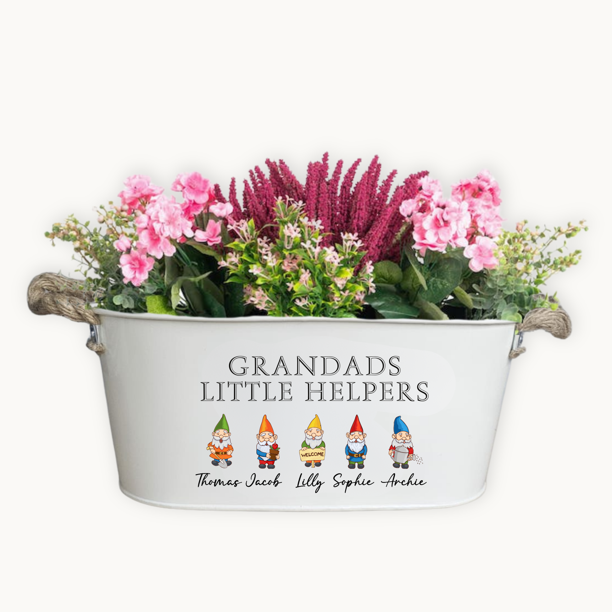 Decorative planter with flowers and personalized text on a white background