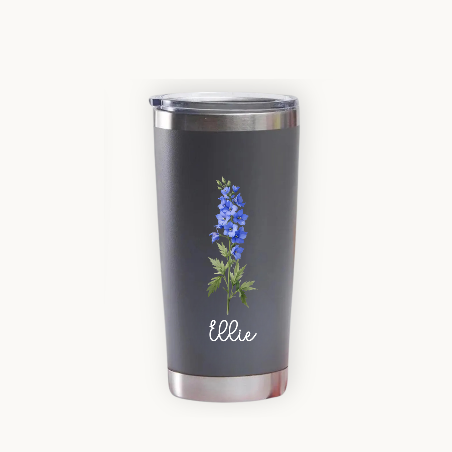 Gray tumbler with floral design and 'Ellie' text on a white background