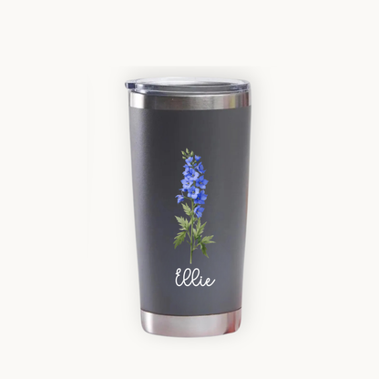 Gray tumbler with floral design and 'Ellie' text on a white background