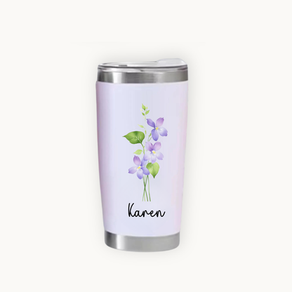 Tumbler with birth floral design and name 'Karen' on a white background