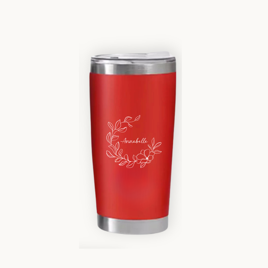 Red tumbler with silver lid and floral design on a white background