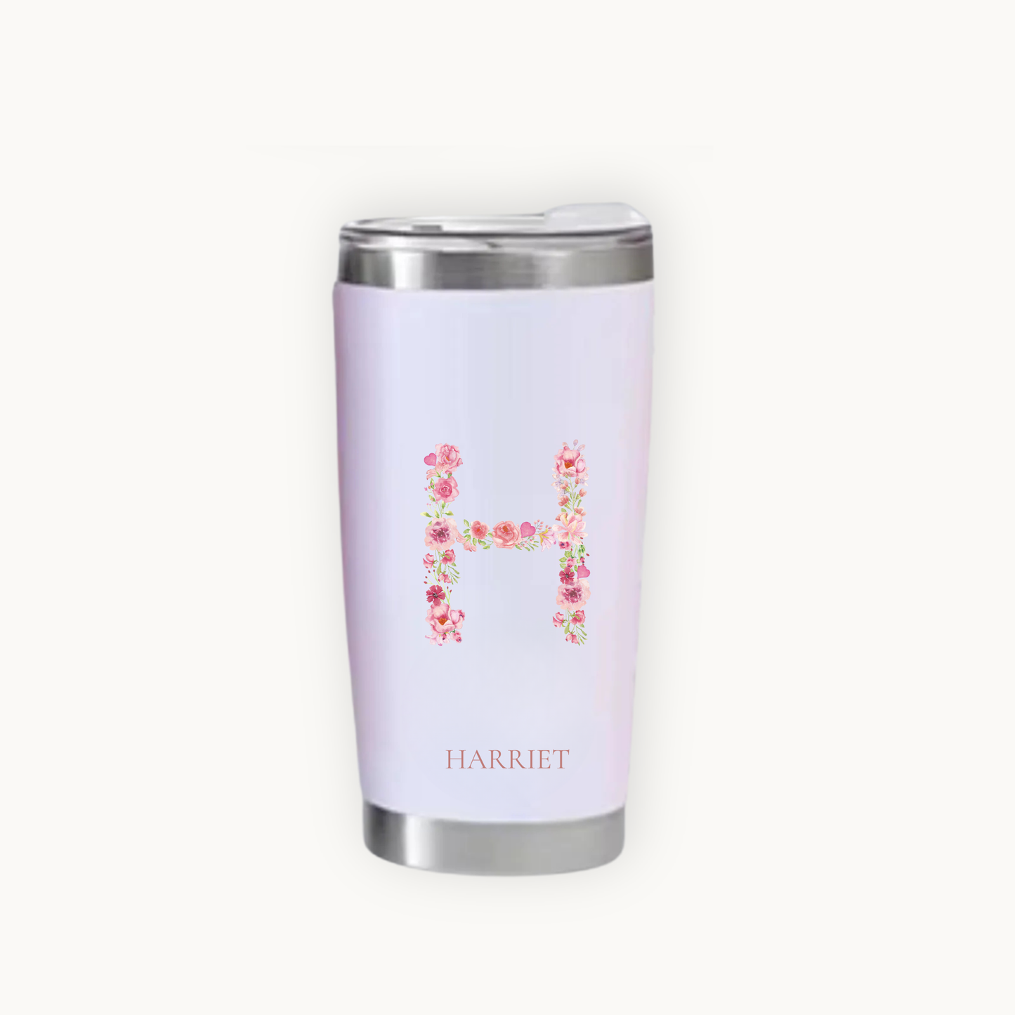 Pink tumbler with floral letter 'H' and name 'Harriet'