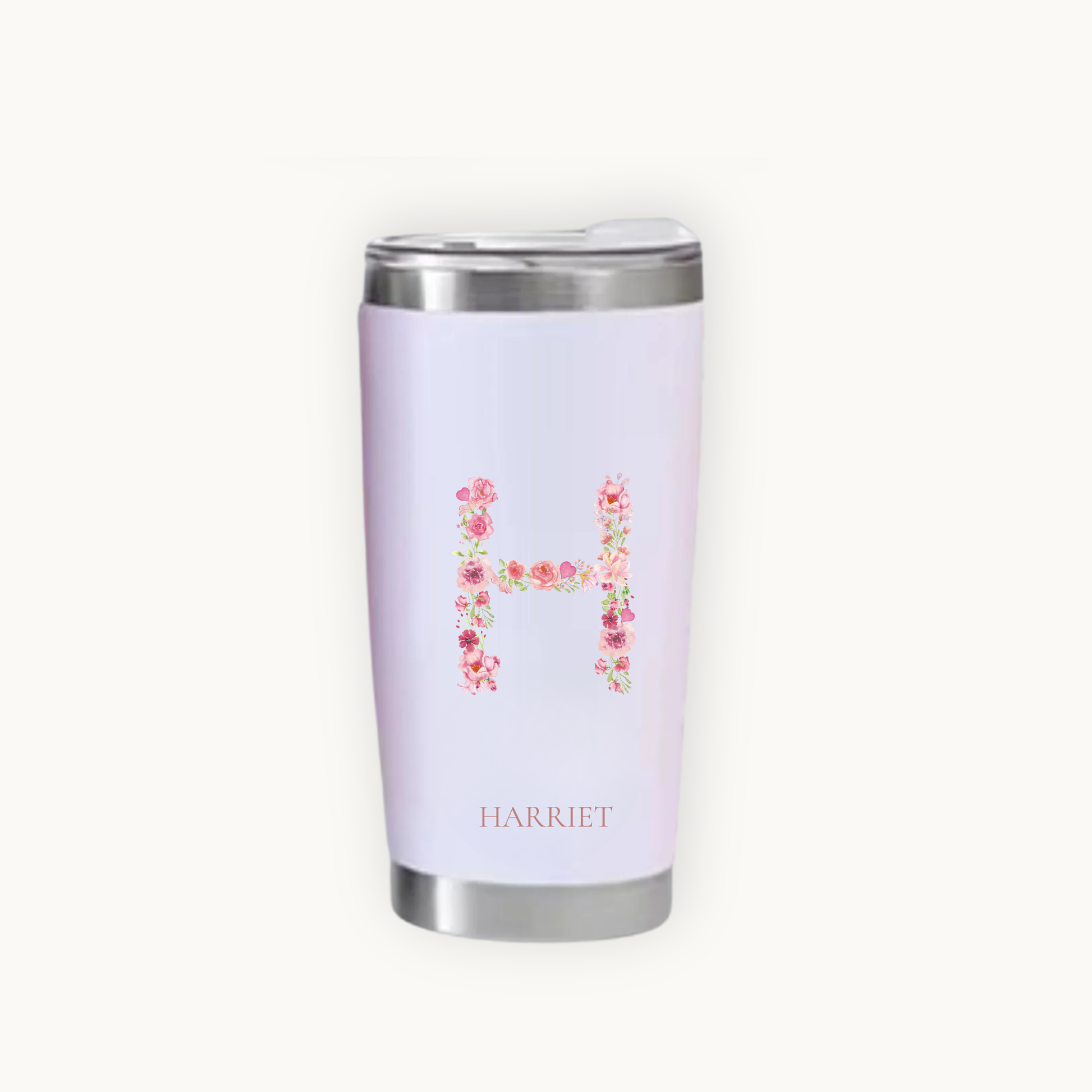 Pink tumbler with floral letter 'H' and name 'Harriet'