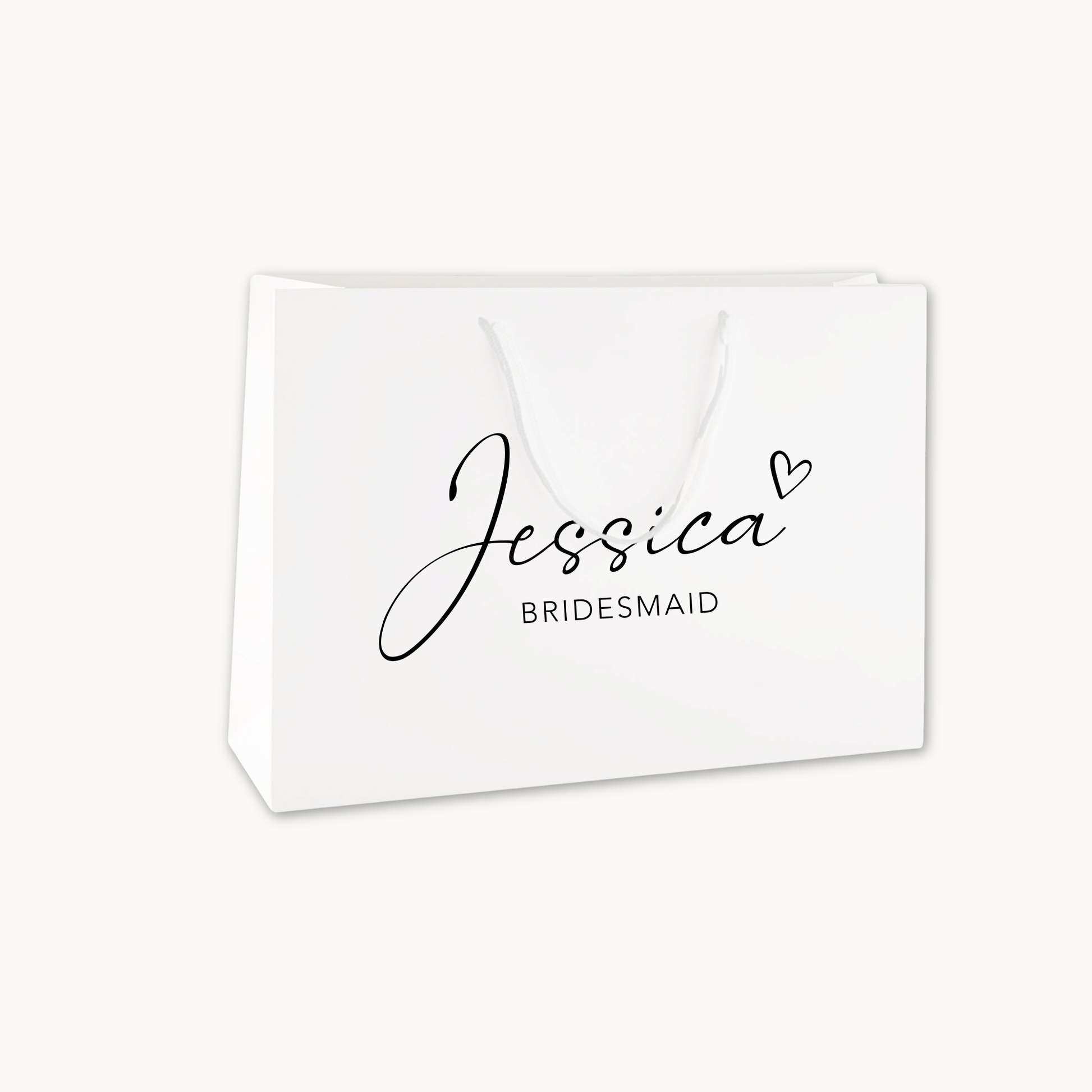 Luxury white gift bag with cotton rope handles printed with the words Jessica and Bridesmaid in script black font