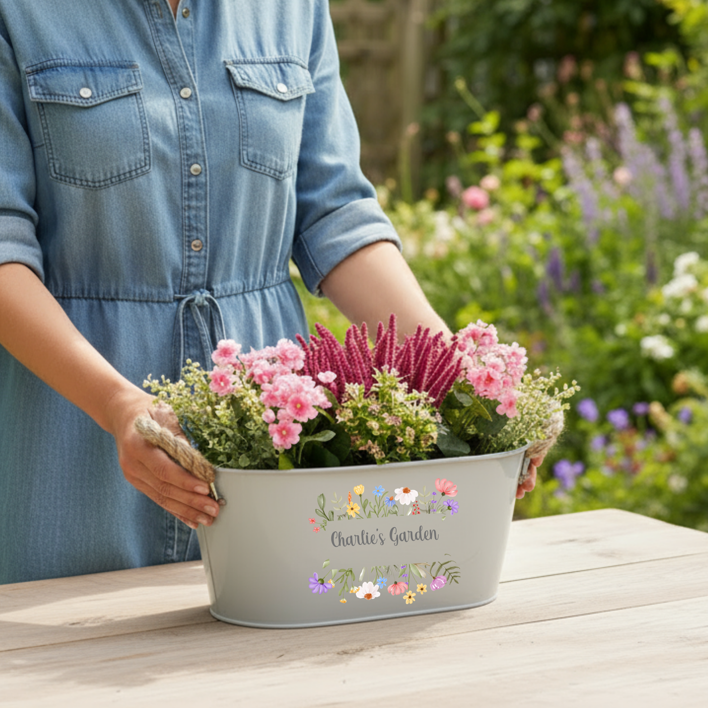 Custom name garden planter in grey with floral border design