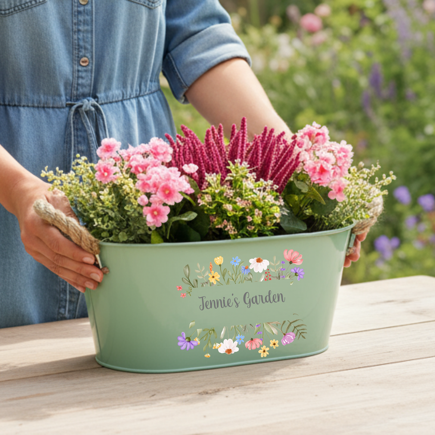 Personalised metal flower planter with rope handles and floral lettering