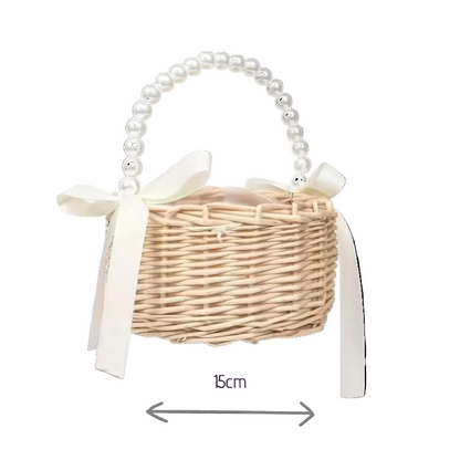 Wicker basket with pearl handle and white ribbon, shown with measurements on a white background